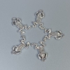 Colgante Rana de color plata, dimensiones 20×13×3 mm ±, agujero de diámetro 1,5 mm ±, empaque 20 g (~18 uds.)
