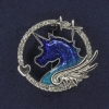Broche unicornio con cristales blancos, esmalte y metal plateado 30x32 mm+