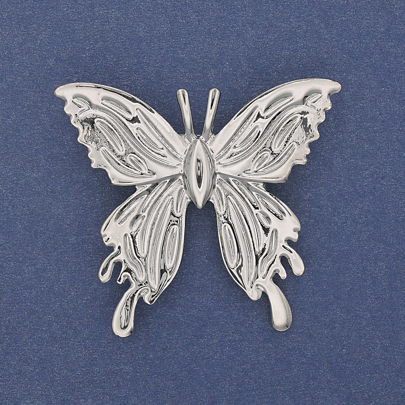 Broche mariposa de metal plateado, 45×42 mm