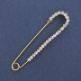 Broche-alfiler con strass blancos, 72×17 mm ±, metal dorado