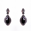Pendientes ovalados calados con cristal negro (40 × 20 mm)