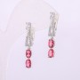 Pendientes Xuping con piedras rosadas 31×5 mm, baño de rodio